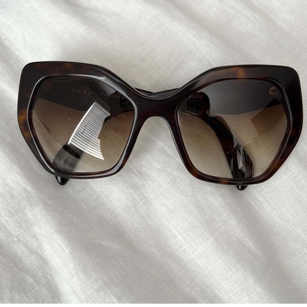 Prada sunglasses with minor scratches selling as is no returns